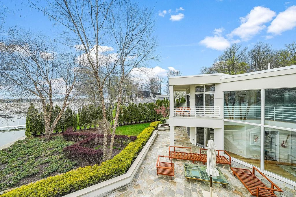 The House in Cassopolis has a Luxury Miami Vibe and a well-designed floor plan with separate split upper levels, now available for sale. This home located at 62234 Carlton Dr, Cassopolis, Michigan