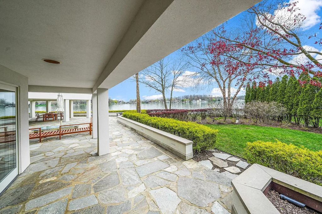 The House in Cassopolis has a Luxury Miami Vibe and a well-designed floor plan with separate split upper levels, now available for sale. This home located at 62234 Carlton Dr, Cassopolis, Michigan