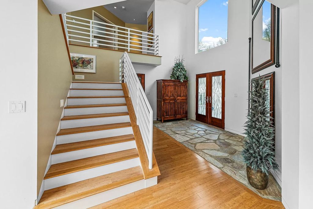 The House in Cassopolis has a Luxury Miami Vibe and a well-designed floor plan with separate split upper levels, now available for sale. This home located at 62234 Carlton Dr, Cassopolis, Michigan