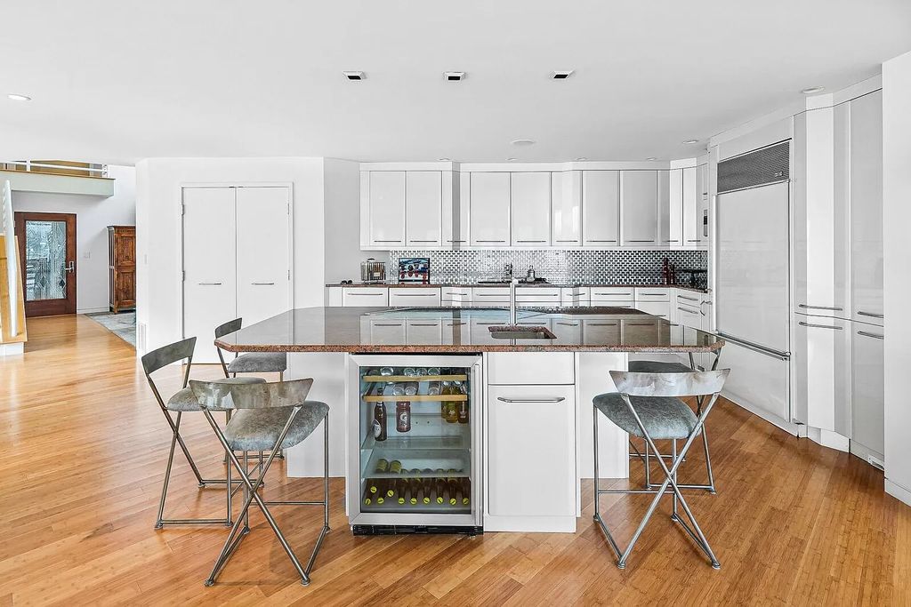 The House in Cassopolis has a Luxury Miami Vibe and a well-designed floor plan with separate split upper levels, now available for sale. This home located at 62234 Carlton Dr, Cassopolis, Michigan