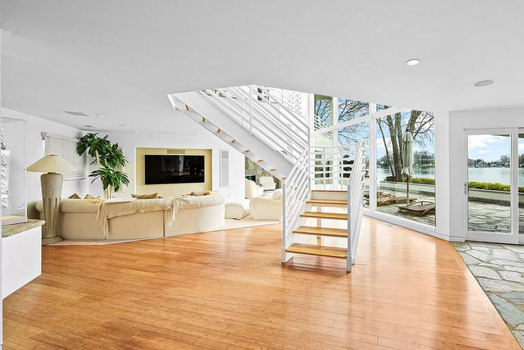 The House in Cassopolis has a Luxury Miami Vibe and a well-designed floor plan with separate split upper levels, now available for sale. This home located at 62234 Carlton Dr, Cassopolis, Michigan