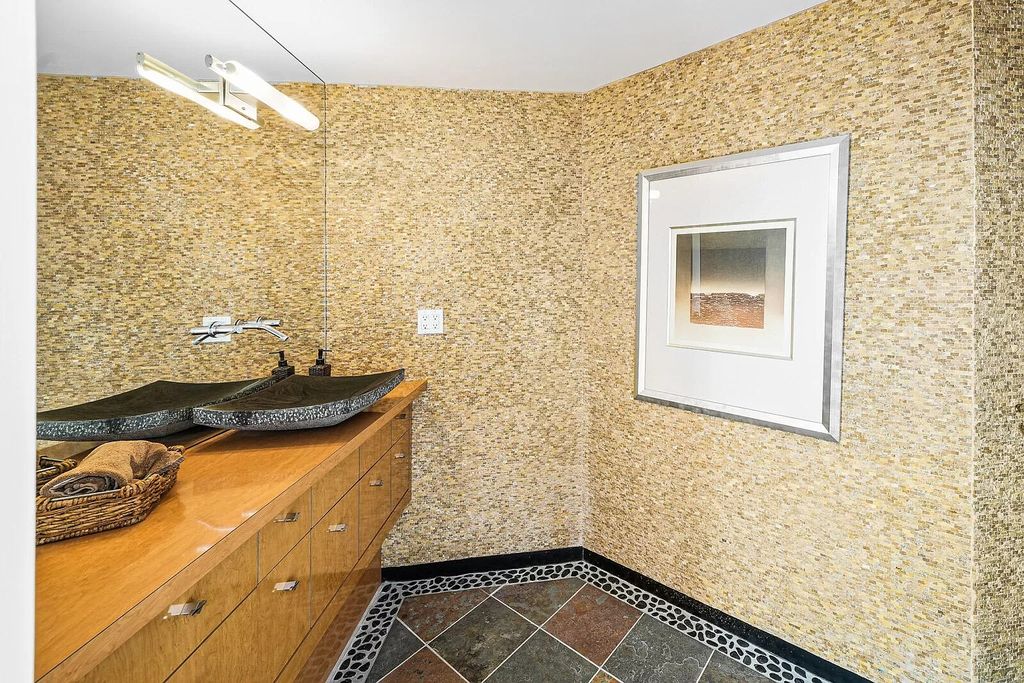The House in Cassopolis has a Luxury Miami Vibe and a well-designed floor plan with separate split upper levels, now available for sale. This home located at 62234 Carlton Dr, Cassopolis, Michigan