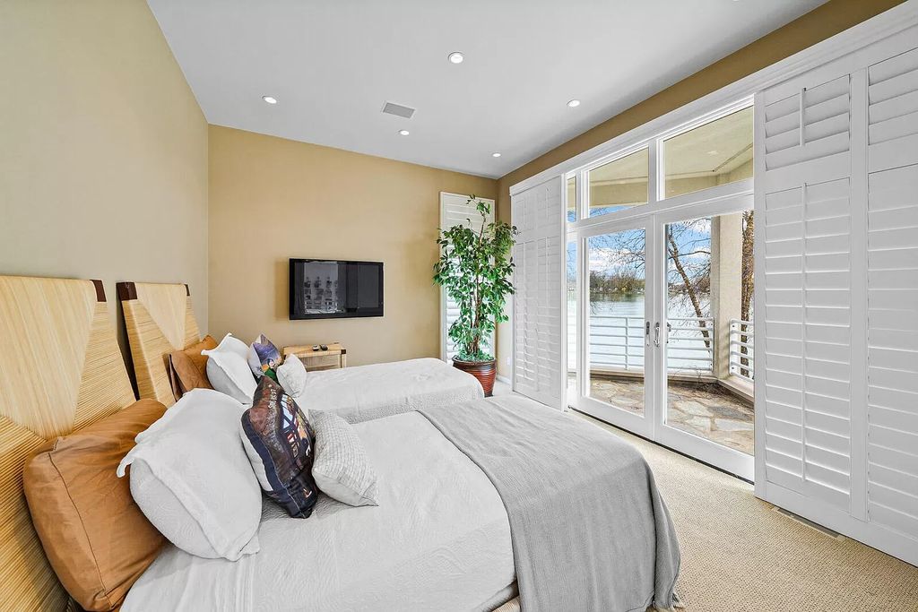 The House in Cassopolis has a Luxury Miami Vibe and a well-designed floor plan with separate split upper levels, now available for sale. This home located at 62234 Carlton Dr, Cassopolis, Michigan