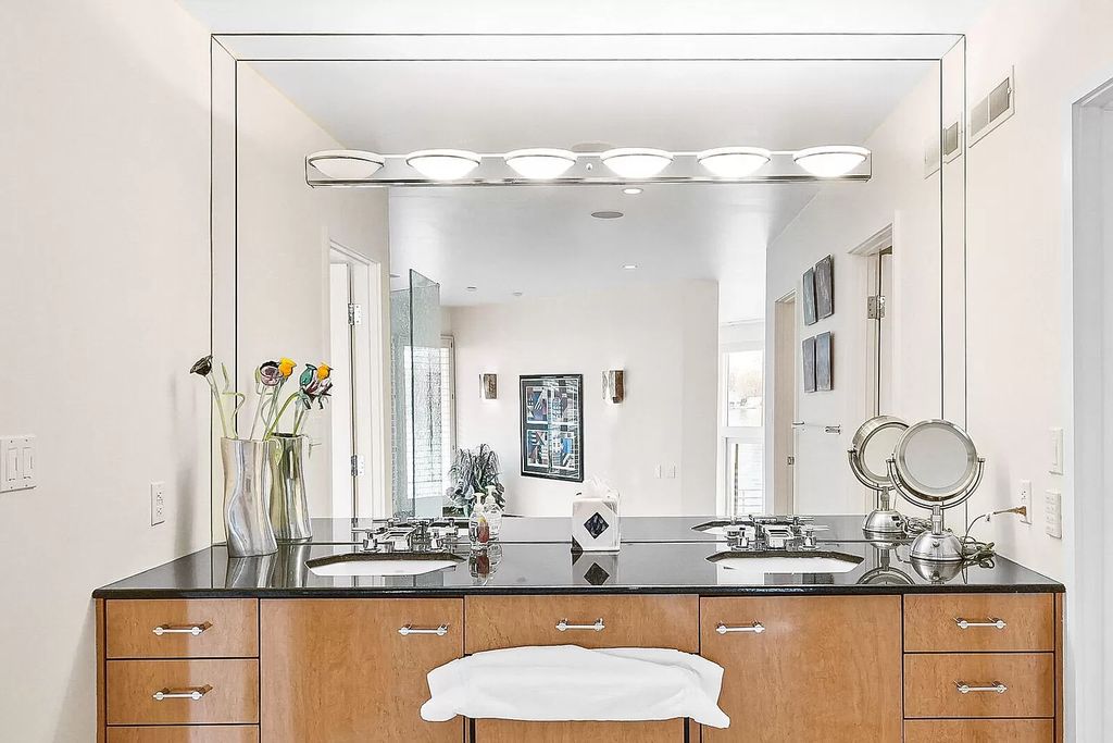 The House in Cassopolis has a Luxury Miami Vibe and a well-designed floor plan with separate split upper levels, now available for sale. This home located at 62234 Carlton Dr, Cassopolis, Michigan