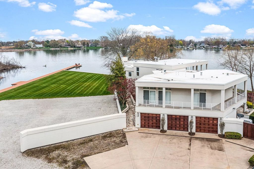 The House in Cassopolis has a Luxury Miami Vibe and a well-designed floor plan with separate split upper levels, now available for sale. This home located at 62234 Carlton Dr, Cassopolis, Michigan