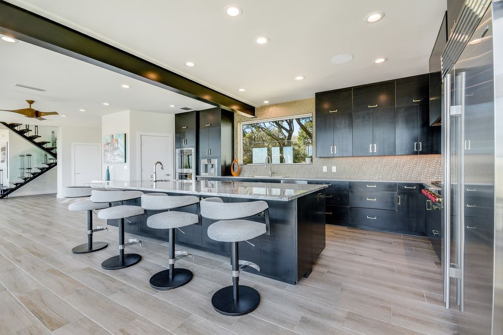 The Home in Austin, a one of a kind property have been significantly upgraded in 2021 with Modern and open floor plan is now available for sale. This home located at 6307 W Courtyard Dr, Austin, Texas