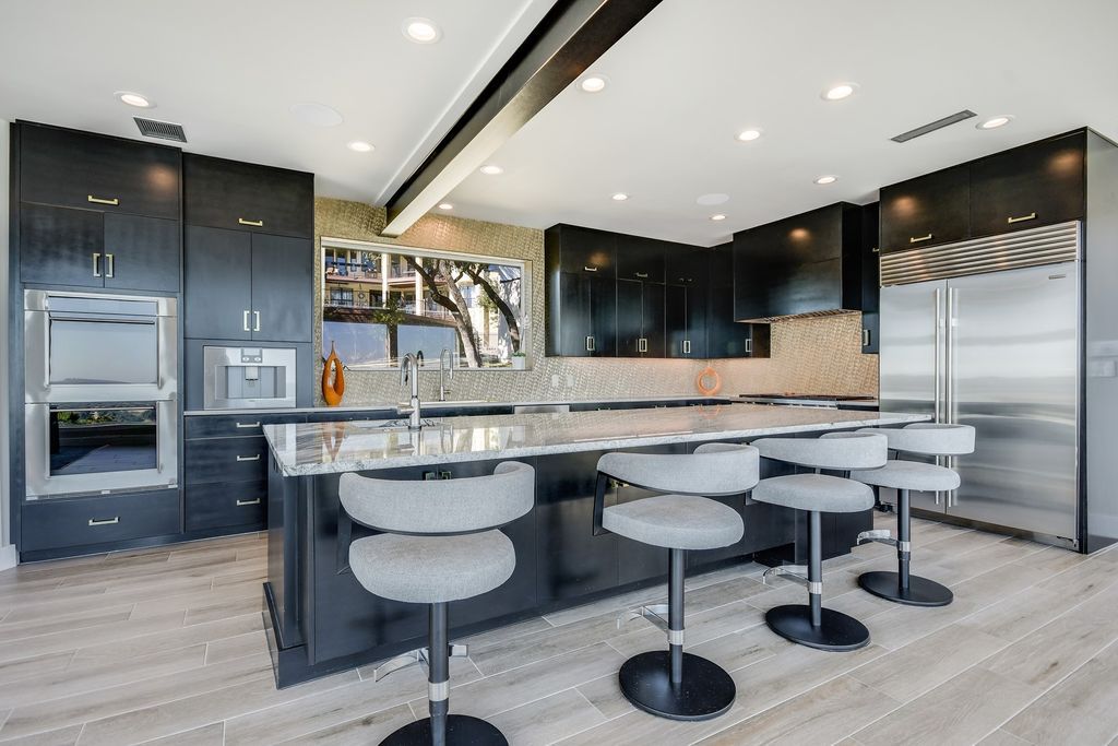 The Home in Austin, a one of a kind property have been significantly upgraded in 2021 with Modern and open floor plan is now available for sale. This home located at 6307 W Courtyard Dr, Austin, Texas
