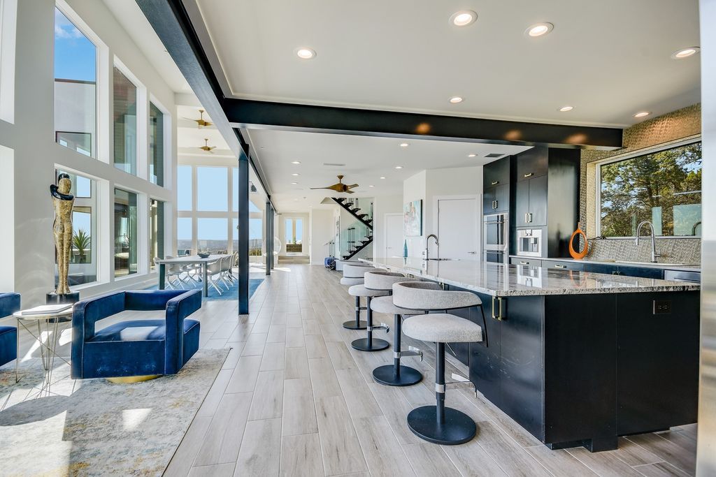 The Home in Austin, a one of a kind property have been significantly upgraded in 2021 with Modern and open floor plan is now available for sale. This home located at 6307 W Courtyard Dr, Austin, Texas