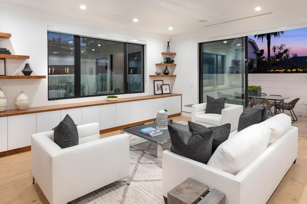 The Home in Venice is a newer construction home features an open floor plan, high ceilings and oversized windows that create a bright crisp ambiance now available for sale. This home located at 2319 Penmar Ave, Venice, California