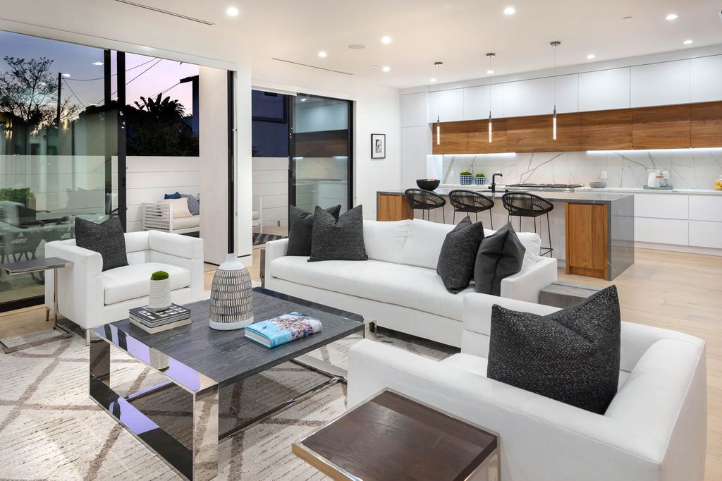 The Home in Venice is a newer construction home features an open floor plan, high ceilings and oversized windows that create a bright crisp ambiance now available for sale. This home located at 2319 Penmar Ave, Venice, California