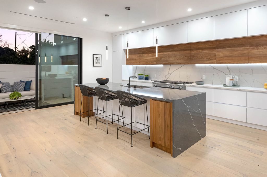 The Home in Venice is a newer construction home features an open floor plan, high ceilings and oversized windows that create a bright crisp ambiance now available for sale. This home located at 2319 Penmar Ave, Venice, California