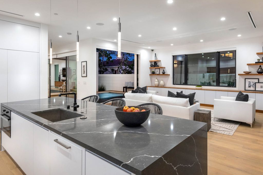 The Home in Venice is a newer construction home features an open floor plan, high ceilings and oversized windows that create a bright crisp ambiance now available for sale. This home located at 2319 Penmar Ave, Venice, California