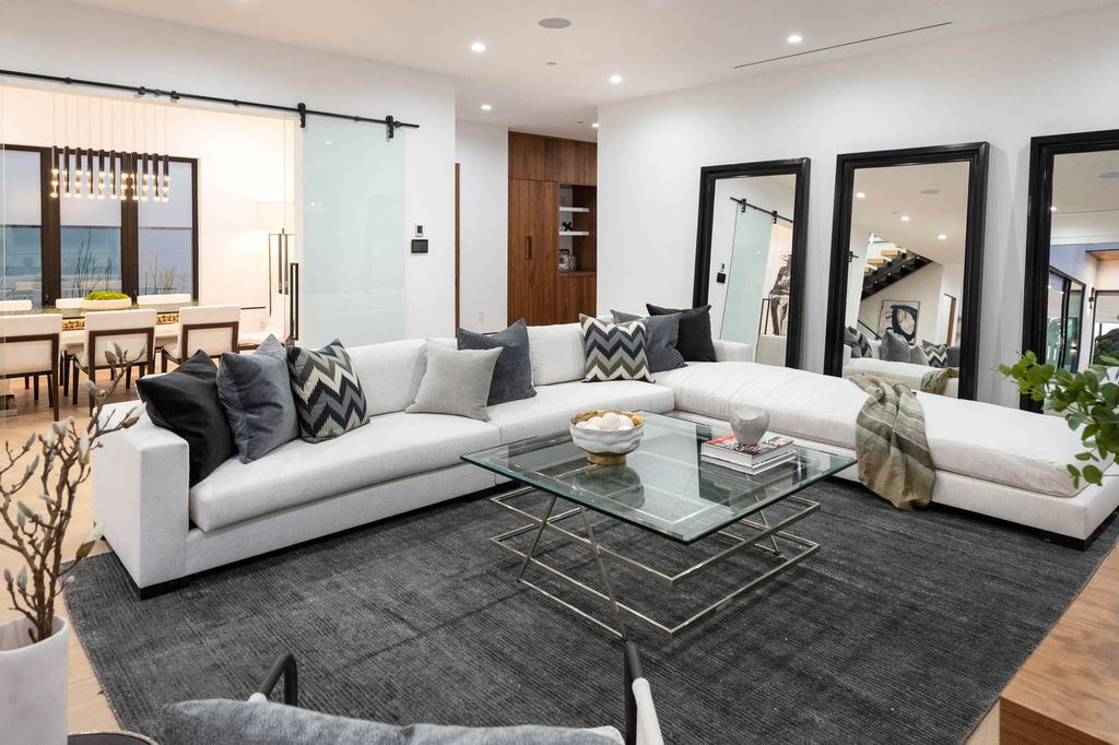 The Home in Venice is a newer construction home features an open floor plan, high ceilings and oversized windows that create a bright crisp ambiance now available for sale. This home located at 2319 Penmar Ave, Venice, California