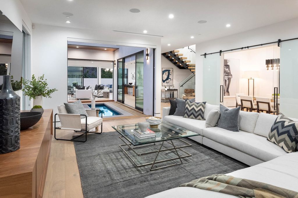 The Home in Venice is a newer construction home features an open floor plan, high ceilings and oversized windows that create a bright crisp ambiance now available for sale. This home located at 2319 Penmar Ave, Venice, California
