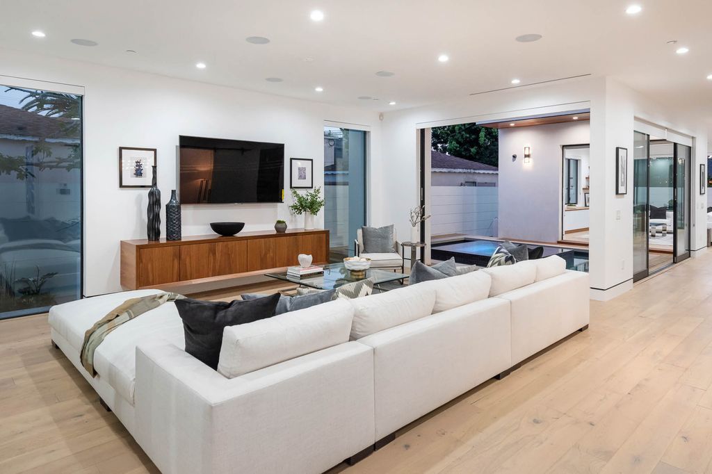 The Home in Venice is a newer construction home features an open floor plan, high ceilings and oversized windows that create a bright crisp ambiance now available for sale. This home located at 2319 Penmar Ave, Venice, California
