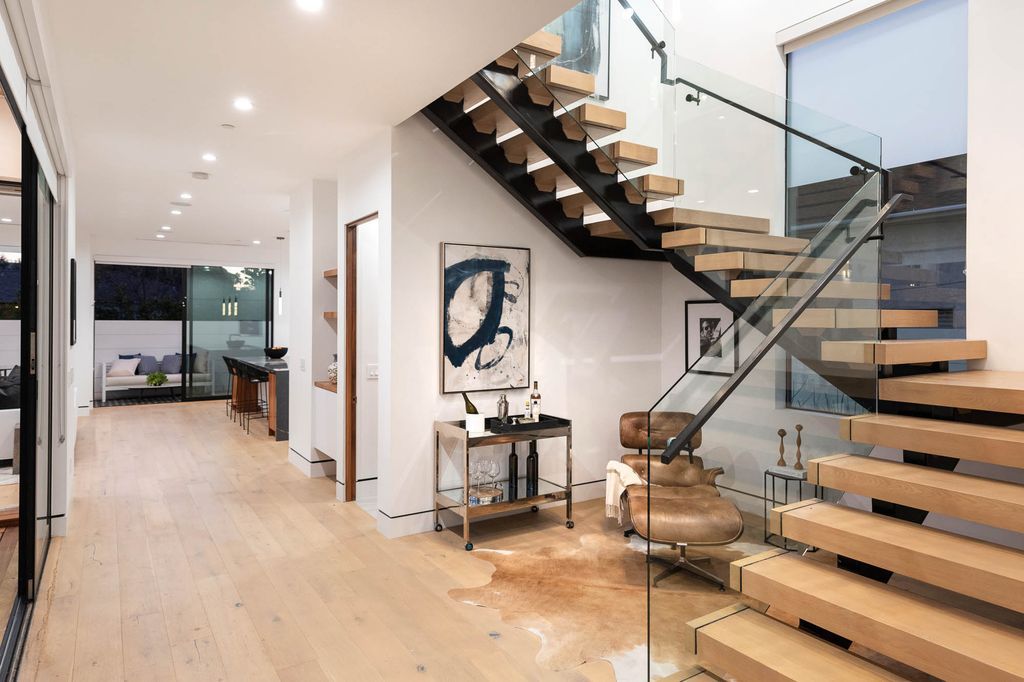 The Home in Venice is a newer construction home features an open floor plan, high ceilings and oversized windows that create a bright crisp ambiance now available for sale. This home located at 2319 Penmar Ave, Venice, California