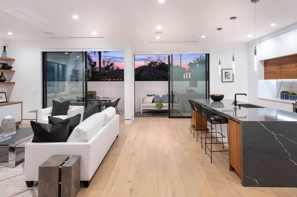 The Home in Venice is a newer construction home features an open floor plan, high ceilings and oversized windows that create a bright crisp ambiance now available for sale. This home located at 2319 Penmar Ave, Venice, California