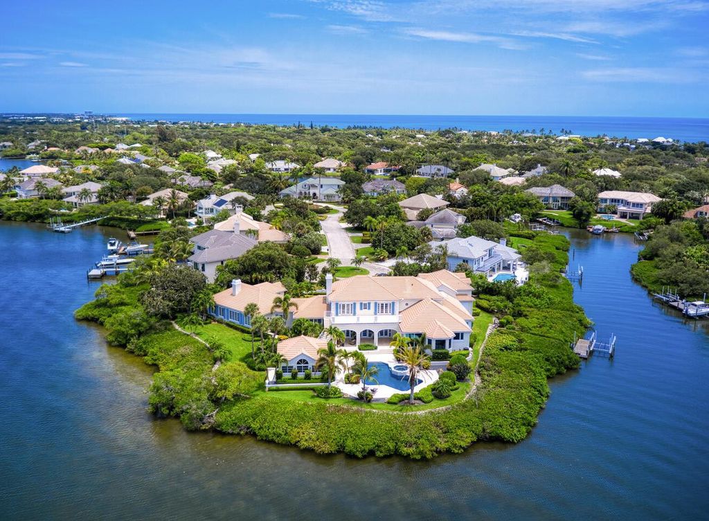 The Home in Vero Beach is a distinguished residence situated on a cul-de-sac point with 270 degrees of unobstructed intracoastal views now available for sale. This home located at 210 Osprey Ct, Vero Beach, Florida