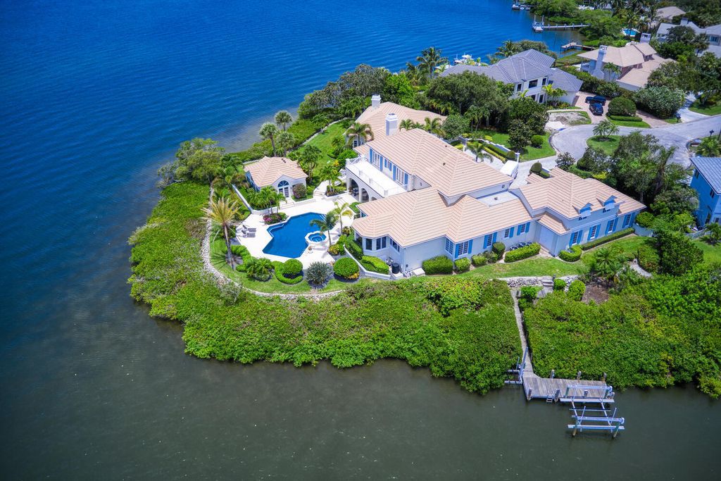 The Home in Vero Beach is a distinguished residence situated on a cul-de-sac point with 270 degrees of unobstructed intracoastal views now available for sale. This home located at 210 Osprey Ct, Vero Beach, Florida