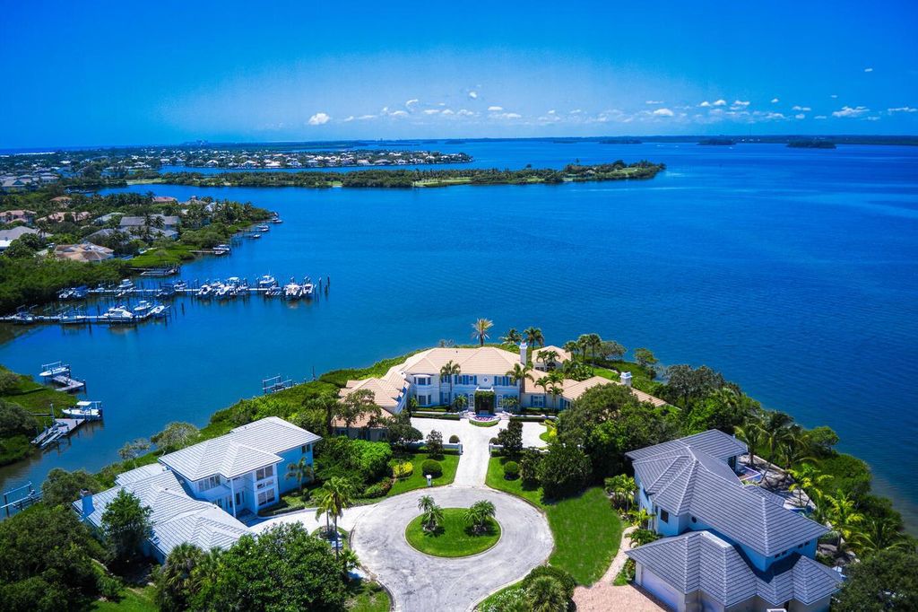 The Home in Vero Beach is a distinguished residence situated on a cul-de-sac point with 270 degrees of unobstructed intracoastal views now available for sale. This home located at 210 Osprey Ct, Vero Beach, Florida