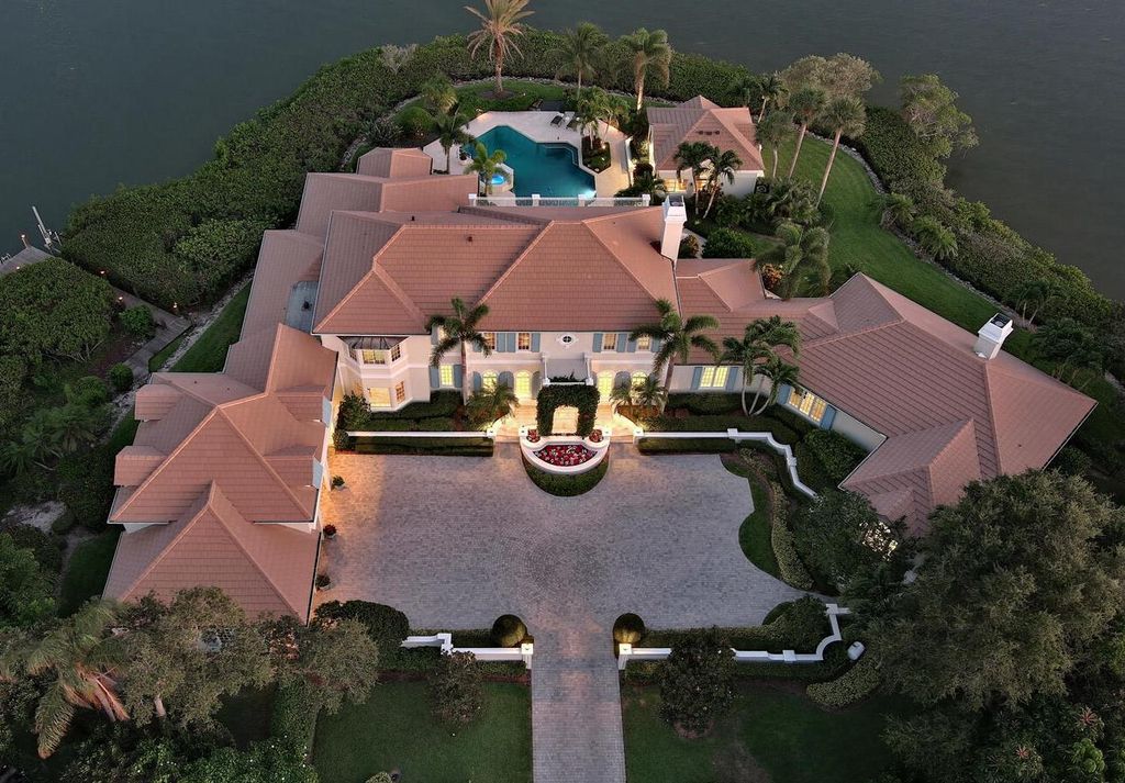 The Home in Vero Beach is a distinguished residence situated on a cul-de-sac point with 270 degrees of unobstructed intracoastal views now available for sale. This home located at 210 Osprey Ct, Vero Beach, Florida