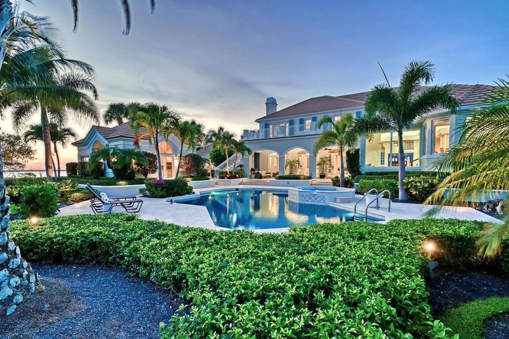The Home in Vero Beach is a distinguished residence situated on a cul-de-sac point with 270 degrees of unobstructed intracoastal views now available for sale. This home located at 210 Osprey Ct, Vero Beach, Florida