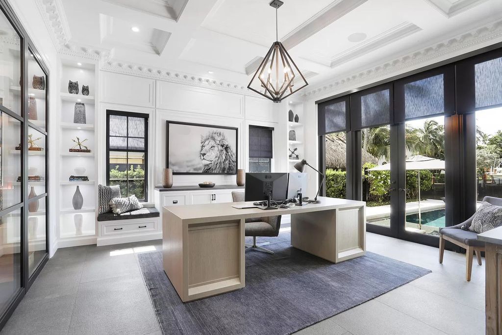 The Home in Boca Raton, a spectacularly custom crafted contemporary waterfront estate boasting exceptional indoor-outdoor living is now available for sale. This home located at 550 Golden Harbour Dr, Boca Raton, Florida