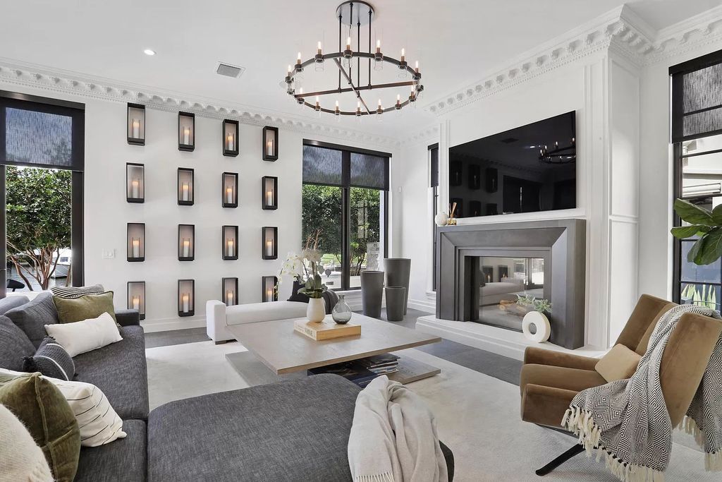 The Home in Boca Raton, a spectacularly custom crafted contemporary waterfront estate boasting exceptional indoor-outdoor living is now available for sale. This home located at 550 Golden Harbour Dr, Boca Raton, Florida