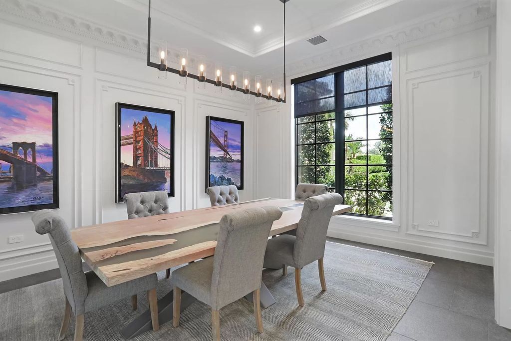 The Home in Boca Raton, a spectacularly custom crafted contemporary waterfront estate boasting exceptional indoor-outdoor living is now available for sale. This home located at 550 Golden Harbour Dr, Boca Raton, Florida