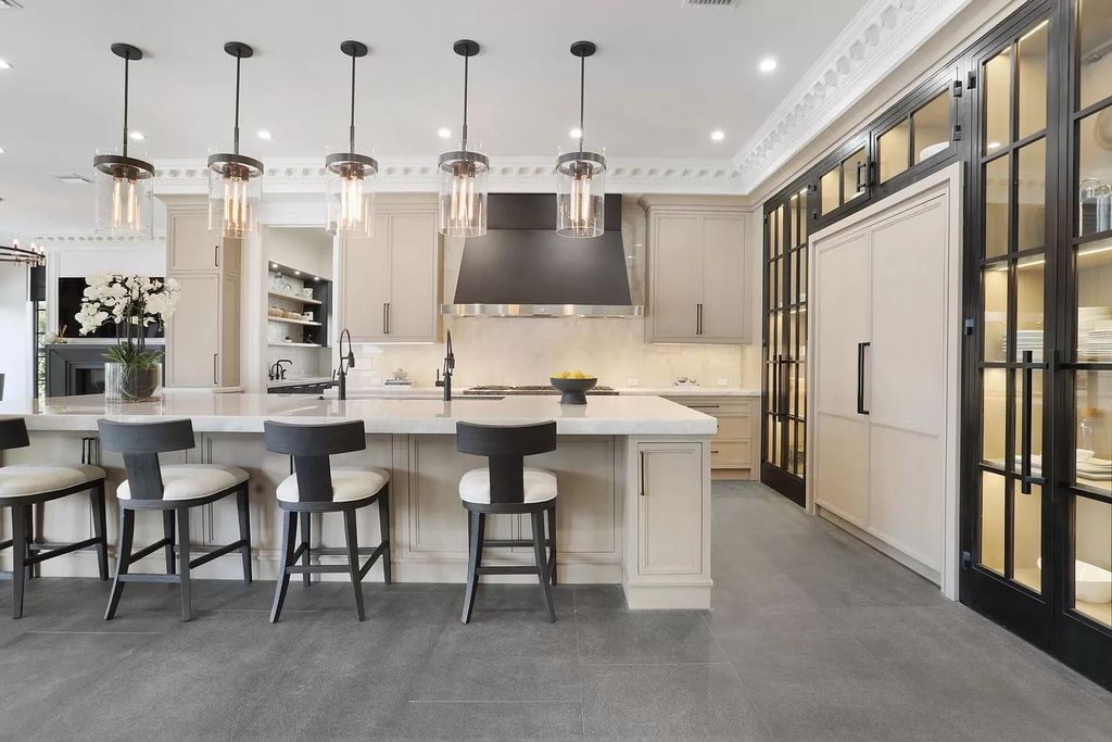 The Home in Boca Raton, a spectacularly custom crafted contemporary waterfront estate boasting exceptional indoor-outdoor living is now available for sale. This home located at 550 Golden Harbour Dr, Boca Raton, Florida