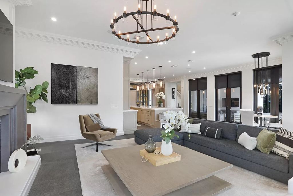 The Home in Boca Raton, a spectacularly custom crafted contemporary waterfront estate boasting exceptional indoor-outdoor living is now available for sale. This home located at 550 Golden Harbour Dr, Boca Raton, Florida