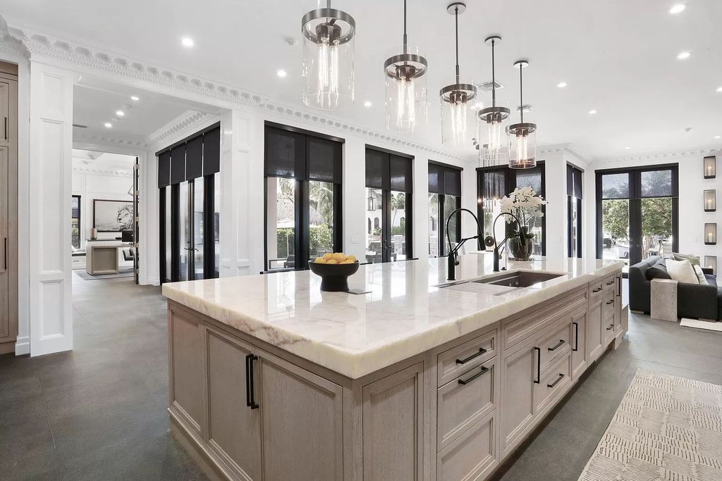 The Home in Boca Raton, a spectacularly custom crafted contemporary waterfront estate boasting exceptional indoor-outdoor living is now available for sale. This home located at 550 Golden Harbour Dr, Boca Raton, Florida