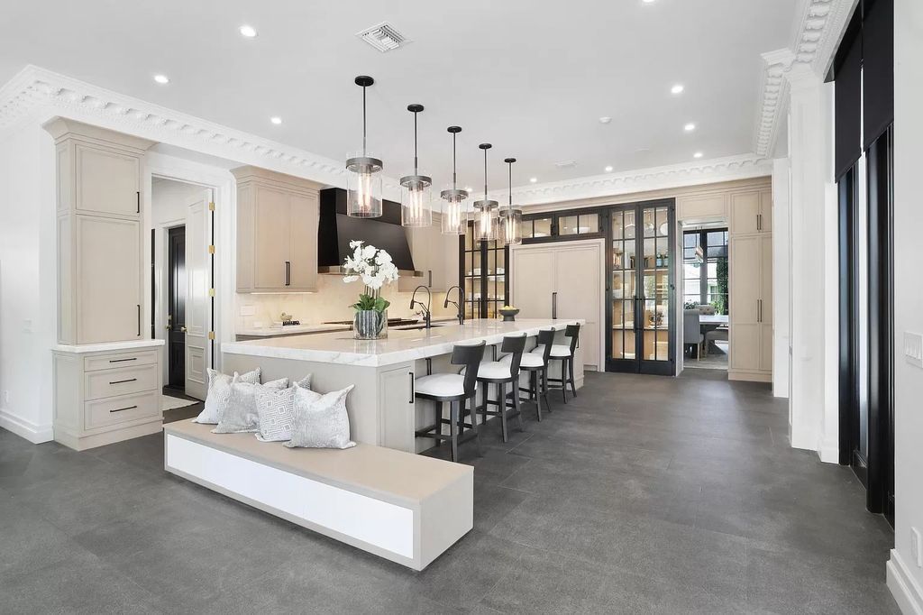 The Home in Boca Raton, a spectacularly custom crafted contemporary waterfront estate boasting exceptional indoor-outdoor living is now available for sale. This home located at 550 Golden Harbour Dr, Boca Raton, Florida