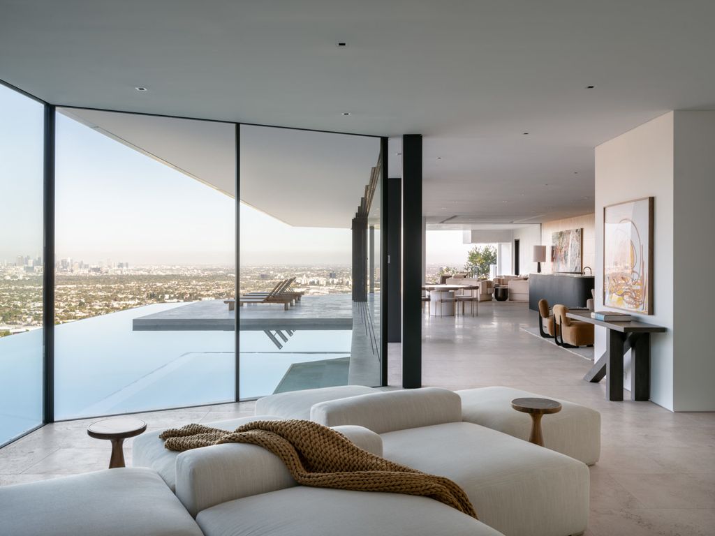 The Home in Los Angeles is a brand new modern mansion designed by Vantage Design Group features the finest finishes, incredible volume, and jetliner views now available for sale. This home located at 11630 Moraga Ln, Los Angeles, California