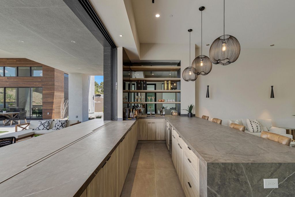 The Home in Las Vegas is a Brand new modern single-story dream compound within minutes from the Lone Mountain regional and equestrian park and the shops at Downtown Summerlin now available for sale. This home located at 4261 N Grand Canyon Dr, Las Vegas, Nevada