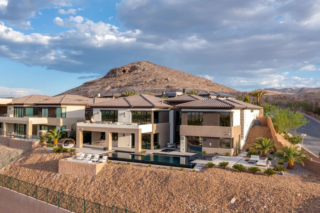 The Home in Las Vegas is an awe-inspiring ultra-modern fully-furnished residence boasts all the modern living amenities for entertaining and family gatherings now available for sale. This home located at 11106 Villa Bellagio Dr, Las Vegas, Nevada