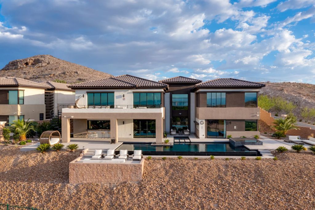 The Home in Las Vegas is an awe-inspiring ultra-modern fully-furnished residence boasts all the modern living amenities for entertaining and family gatherings now available for sale. This home located at 11106 Villa Bellagio Dr, Las Vegas, Nevada