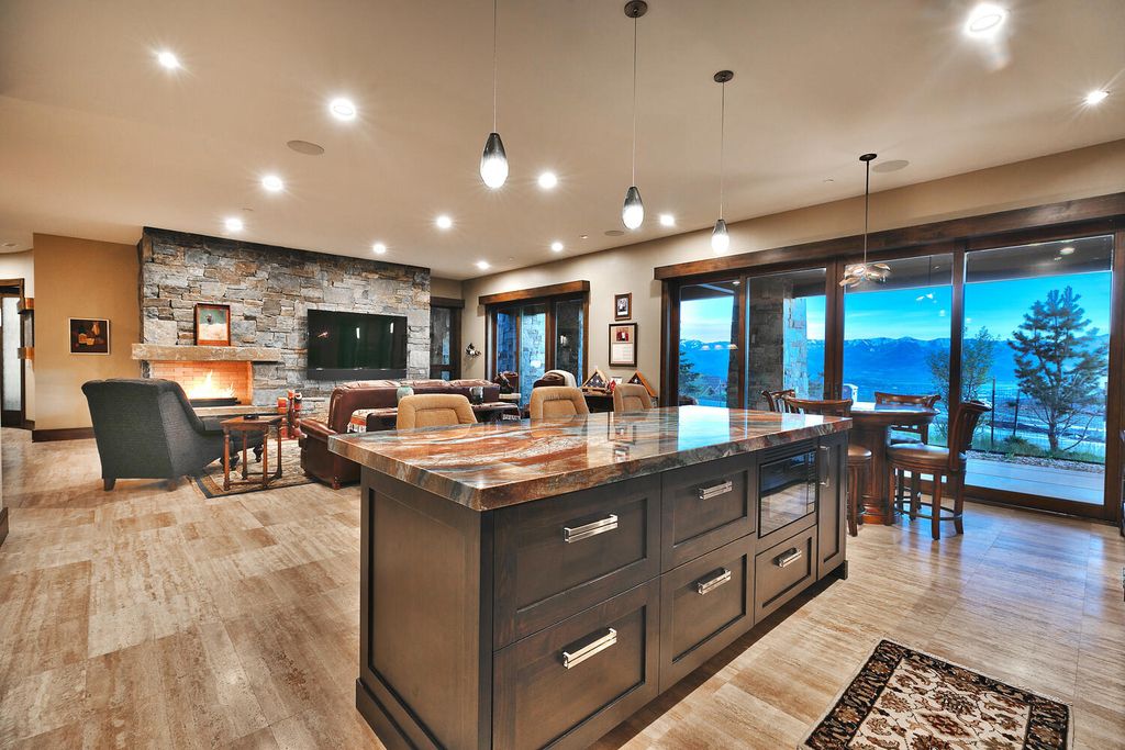 The Home in Park City, a spectacular mountain view residence designed by 4C Design Group and meticulously built by Douglas Knight perfect for parties and family gatherings is now available for sale. This home located at 9021 N Promontory Summit Dr, Park City, Utah