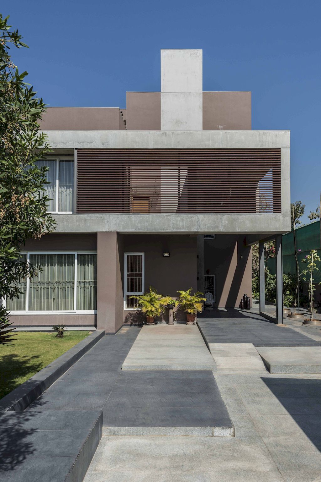 Twin Home with Stunning Open Spaces in India by The Grid Architects 10