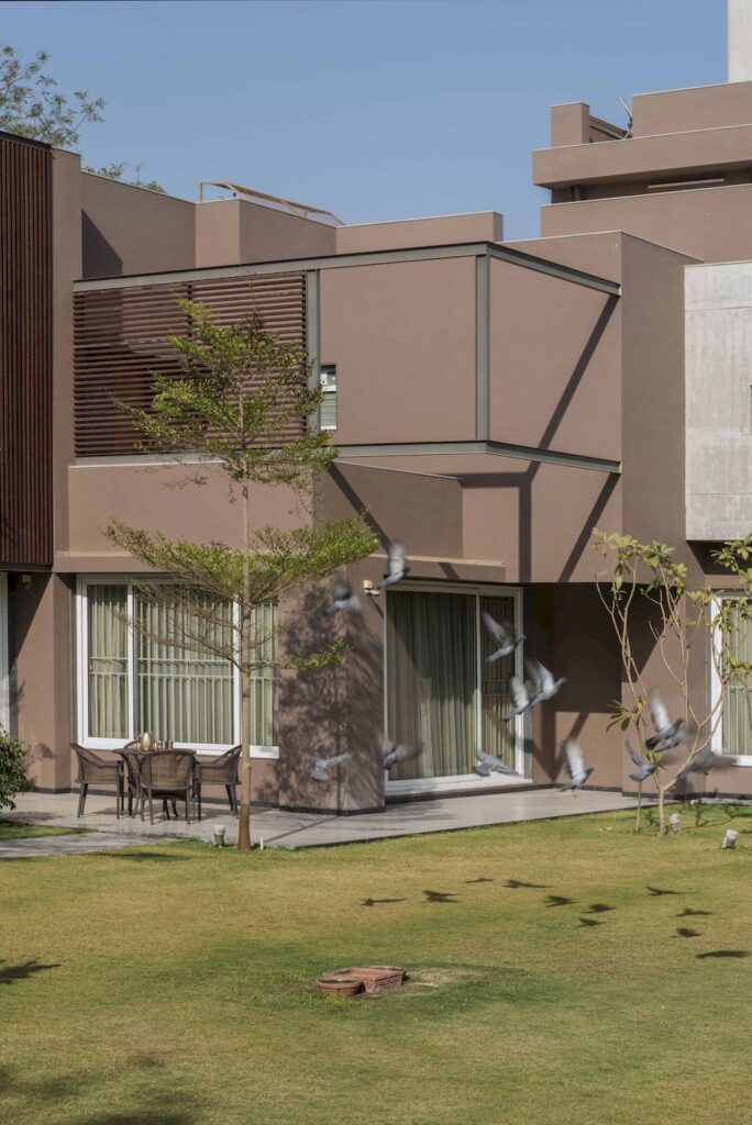 Twin Home with Stunning Open Spaces in India by The Grid Architects