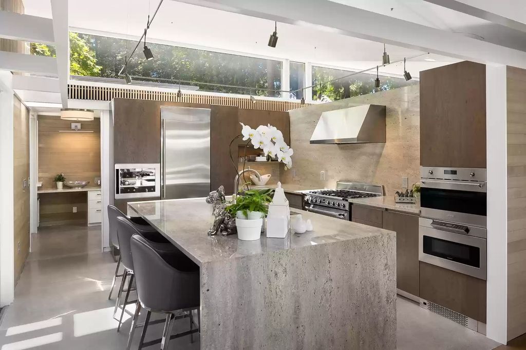 The House in Bainbridge Island is designed as the family home of renowned engineer Jack Christiansen, now available for sale. This home located at 7799 Hansen Road NE, Bainbridge Island, Washington