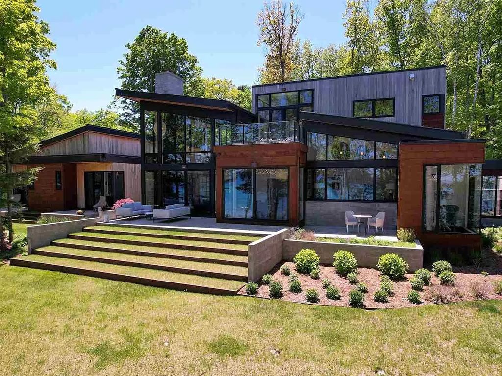 The Home in Suttons Bay is built by Easling Construction and designed by Ray Kendra & ReDesign Interiors, now available for sale. This home located at 3693 S Bay Ridge Ln, Suttons Bay, Michigan