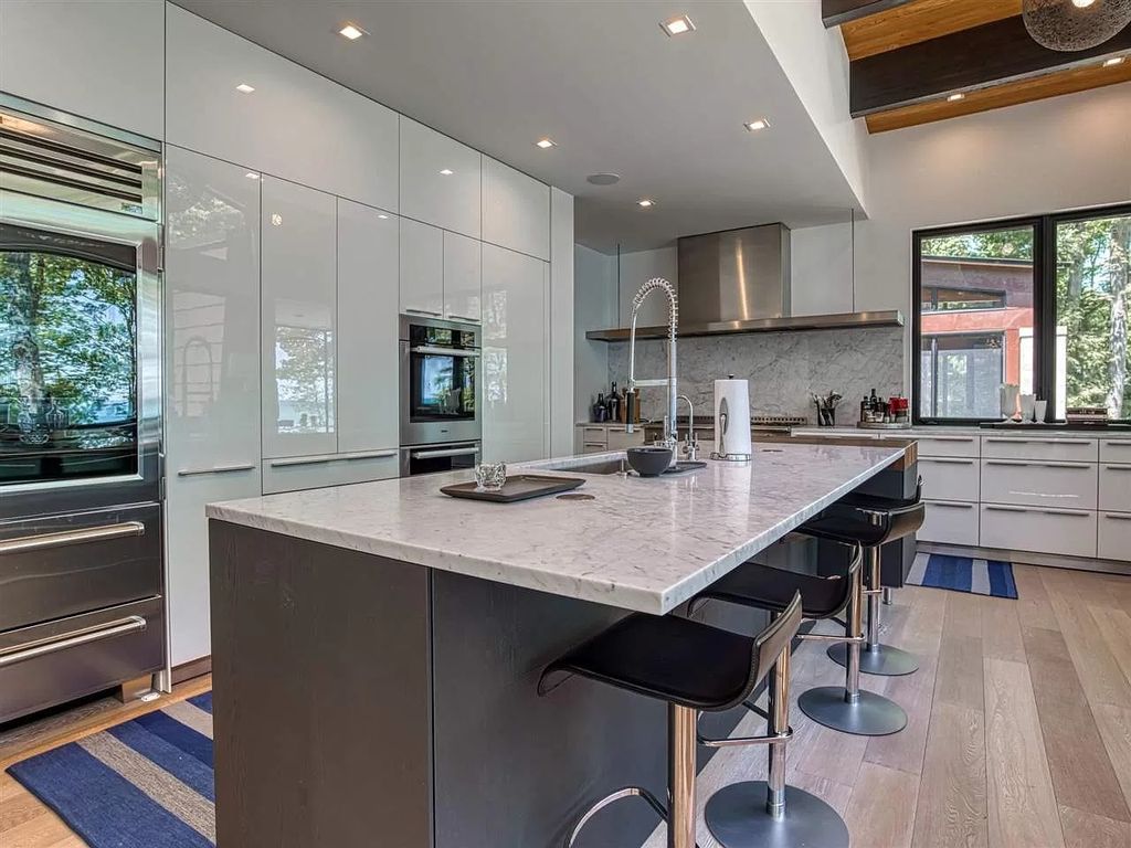 The Home in Suttons Bay is built by Easling Construction and designed by Ray Kendra & ReDesign Interiors, now available for sale. This home located at 3693 S Bay Ridge Ln, Suttons Bay, Michigan