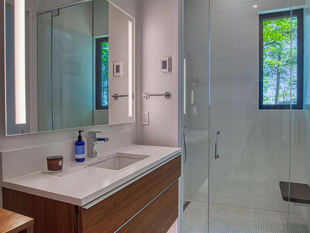 The Home in Suttons Bay is built by Easling Construction and designed by Ray Kendra & ReDesign Interiors, now available for sale. This home located at 3693 S Bay Ridge Ln, Suttons Bay, Michigan