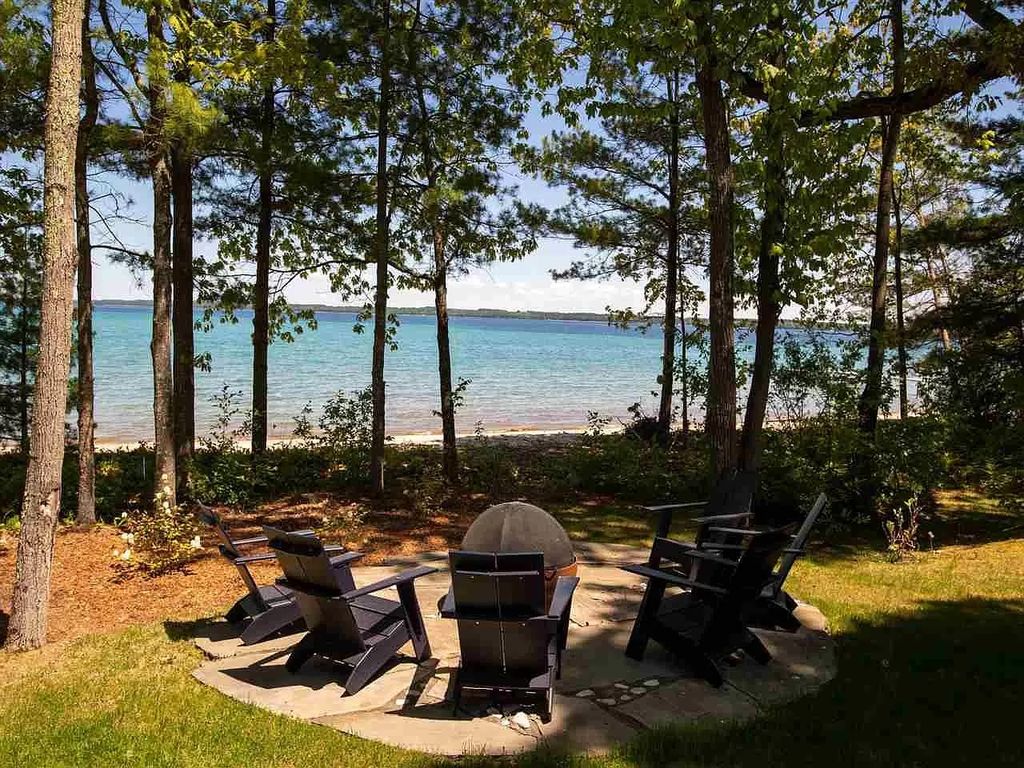 The Home in Suttons Bay is built by Easling Construction and designed by Ray Kendra & ReDesign Interiors, now available for sale. This home located at 3693 S Bay Ridge Ln, Suttons Bay, Michigan