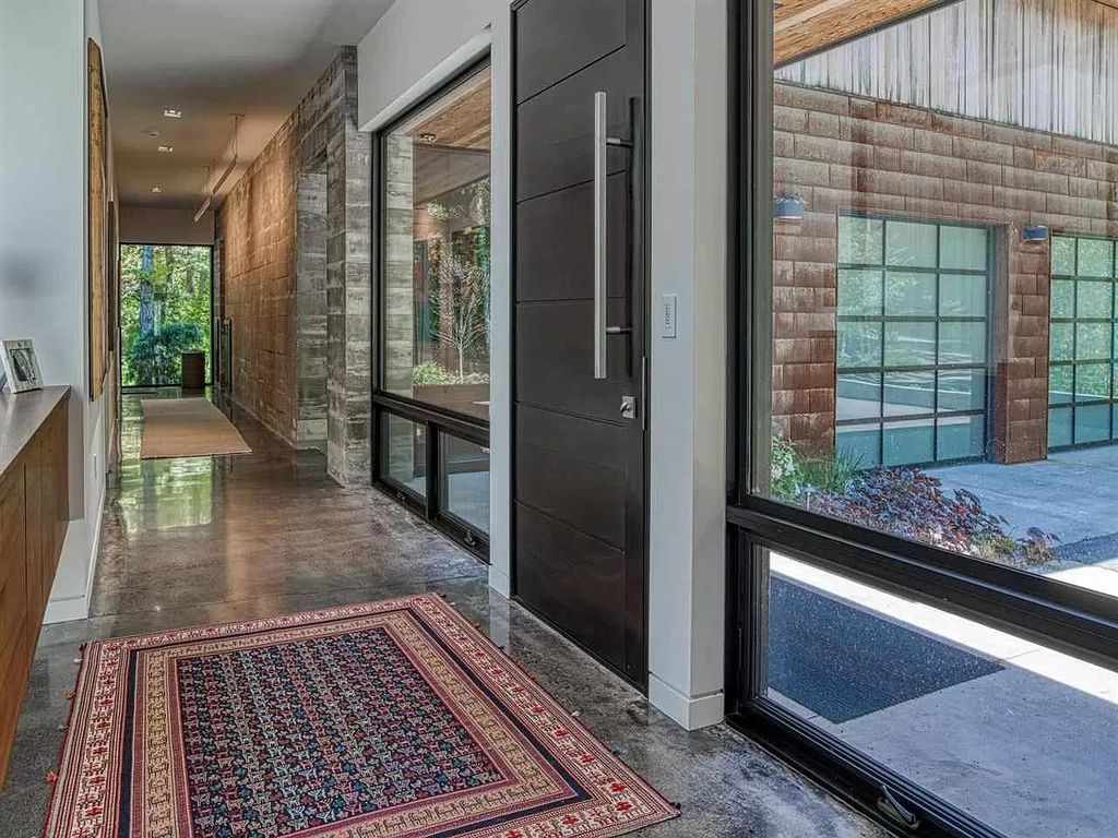 The Home in Suttons Bay is built by Easling Construction and designed by Ray Kendra & ReDesign Interiors, now available for sale. This home located at 3693 S Bay Ridge Ln, Suttons Bay, Michigan