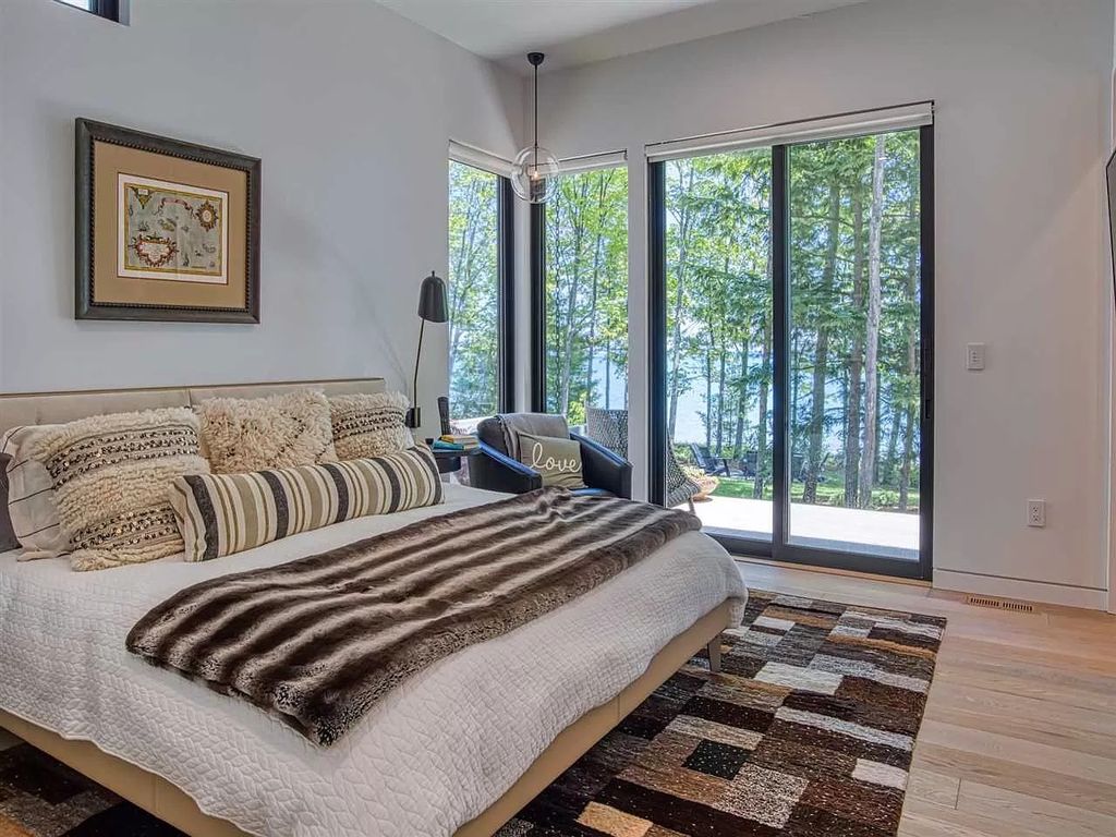 The Home in Suttons Bay is built by Easling Construction and designed by Ray Kendra & ReDesign Interiors, now available for sale. This home located at 3693 S Bay Ridge Ln, Suttons Bay, Michigan