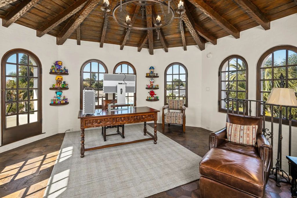 The Estate in Coronado, a historical landmark sits on a palm-lined promenade offering state-of-the-art amenities for optimal luxury living space, 100-year-old rustic olive trees, three fountains, a putting green, secret garden is now available for sale. This home located at 1127 F Ave, Coronado, California