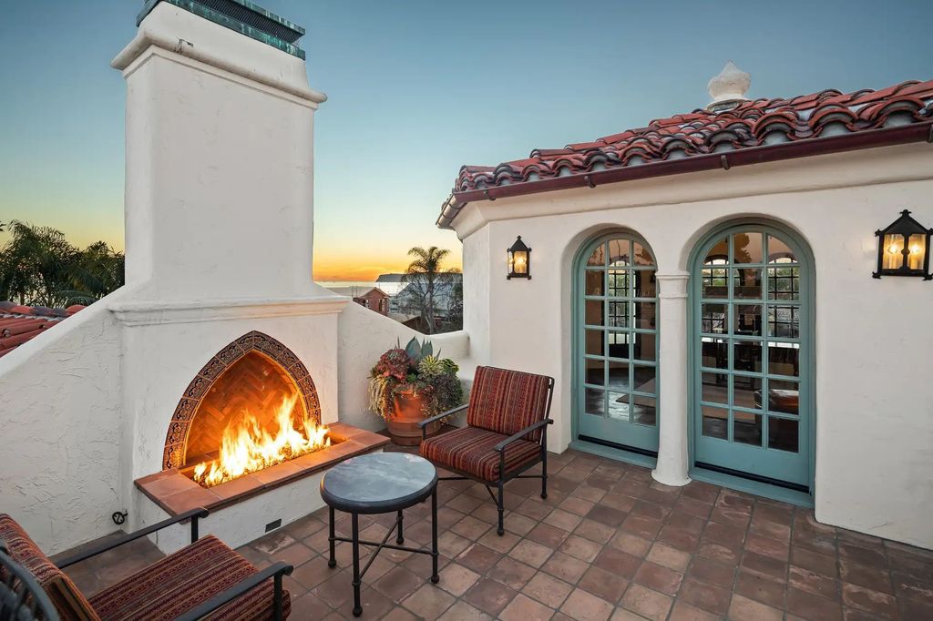 The Estate in Coronado, a historical landmark sits on a palm-lined promenade offering state-of-the-art amenities for optimal luxury living space, 100-year-old rustic olive trees, three fountains, a putting green, secret garden is now available for sale. This home located at 1127 F Ave, Coronado, California