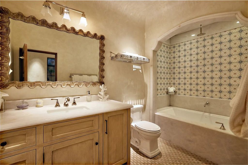 The Estate in Coronado, a historical landmark sits on a palm-lined promenade offering state-of-the-art amenities for optimal luxury living space, 100-year-old rustic olive trees, three fountains, a putting green, secret garden is now available for sale. This home located at 1127 F Ave, Coronado, California